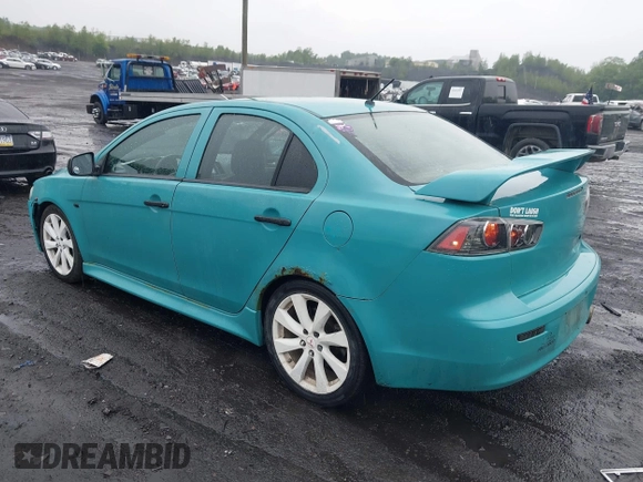 2013 Mitsubishi Lancer GT with VIN JA32U8FW6DU022878, listed as a IAAI auction lot 42449708 with 121,869 mi miles and . Bid and sale history available at DreamBid. Image 3.