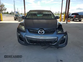 2011 Mazda CX-7 S Grand Touring z VIN JM3ER4D33B0355181, wystawiony jako Copart lot #69687474 z przebiegiem 223 622 mil mil oraz Nie do naprawy • Non repairable. Historia ofert i sprzedaży dostępna na DreamBid. Obrazek 5.
