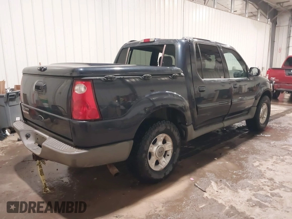 2001 Ford Explorer Sport Trac z VIN 1FMZU77E21UC84338, wystawiony jako IAAI lot #41420422 z przebiegiem 218 094 mil mil oraz . Historia ofert i sprzedaży dostępna na DreamBid. Obrazek 4.