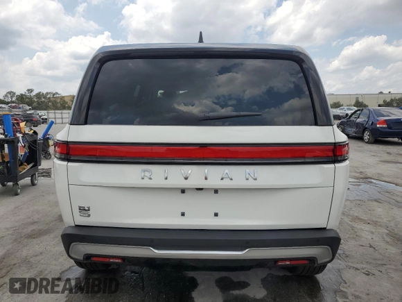 2025 Rivian R1S Adventure z VIN 7PDSGBBA5SN067374, wystawiony jako Copart lot #55279895 z przebiegiem 1 120 mil mil oraz Szkoda całkowita • Salvage title. Historia ofert i sprzedaży dostępna na DreamBid. Obrazek 6.