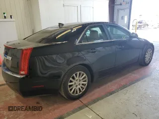 2013 Cadillac CTS Luxury z VIN 1G6DG5E57D0112818, wystawiony jako Copart lot #57937755 z przebiegiem 148 751 mil mil oraz Czysty tytuł • Clean title. Historia ofert i sprzedaży dostępna na DreamBid. Obrazek 3.