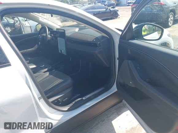 2023 Ford Mustang Mach-E Premium with VIN 3FMTK3SU2PMB05408, listed as a IAAI auction lot 42116244 with 12,092 mi miles and . Bid and sale history available at DreamBid. Image 5.