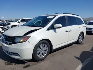 2016 Honda Odyssey EX-L with VIN 5FNRL5H67GB128929, listed as a IAAI auction lot 42126878 with 157,836 mi miles. Bid and sale history available at carsss.com. Image 6.