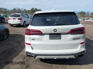 2020 BMW X5 M50i with VIN 5UXJU4C06LLE45651, listed as a IAAI auction lot 41618355 with 70,885 mi miles and . Bid and sale history available at DreamBid. Image 16.