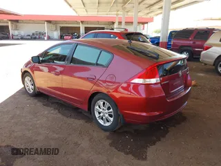 2010 Honda Insight EX z VIN JHMZE2H75AS039340, wystawiony jako IAAI lot #42424092 z przebiegiem 166 525 mil mil oraz . Historia ofert i sprzedaży dostępna na DreamBid. Obrazek 3.