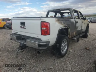 2018 GMC Sierra 2500HD SLT z VIN 1GT12TEY1JF108589, wystawiony jako Copart lot #52713975 z przebiegiem Nie podano mil oraz Nie do naprawy • Non repairable. Historia ofert i sprzedaży dostępna na DreamBid. Obrazek 3.