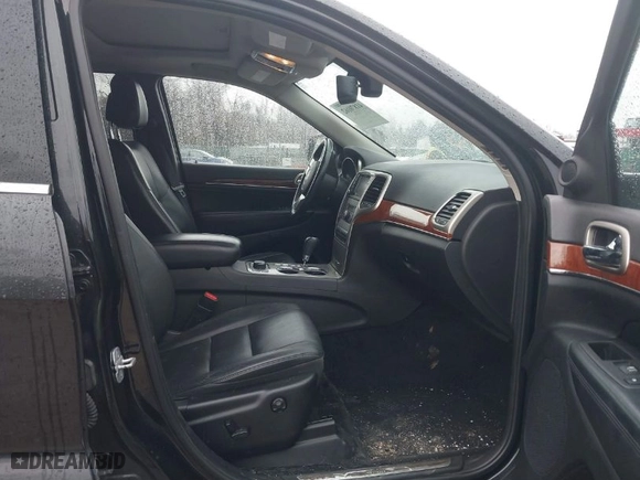2013 Jeep Grand Cherokee Limited with VIN 1C4RJFBG0DC656382, listed as a IAAI auction lot 41870162 with 162,869 mi miles. Bid and sale history available at carsss.com. Image 5.