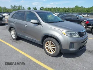 2014 Kia Sorento LX with VIN 5XYKT3A60EG486699, listed as a IAAI auction lot 42143270 with 127,190 mi miles and . Bid and sale history available at DreamBid. Image 1.