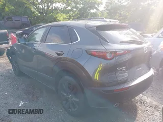 2024 Mazda CX-30 S Select Sport z VIN 3MVDMBBM1RM634542, wystawiony jako IAAI lot #42204673 z przebiegiem 24 694 mil mil oraz . Historia ofert i sprzedaży dostępna na DreamBid. Obrazek 3.