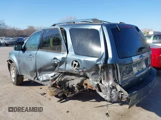 2011 Ford Escape Limited with VIN 1FMCU0E70BKB03218, listed as a IAAI auction lot 41770586 with 159,823 mi miles. Bid and sale history available at carsss.com. Image 6.