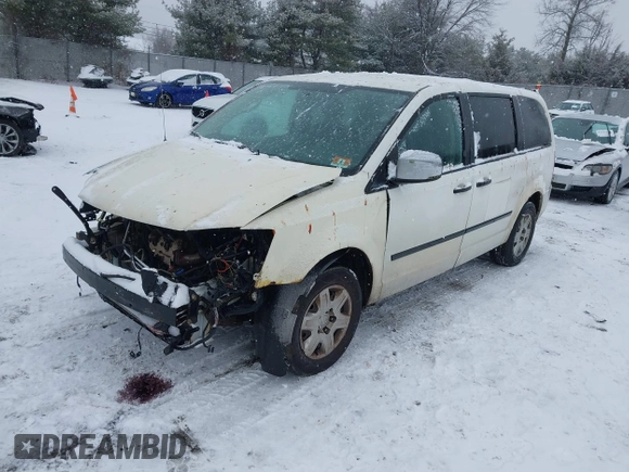 2009 Dodge Grand Caravan with VIN 2D8HN11E19R703857, listed as a IAAI auction lot 41195565 with 199,776 mi miles and . Bid and sale history available at DreamBid. Image 2.