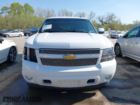 2013 Chevrolet Suburban LT with VIN 1GNSKJE75DR174167, listed as a IAAI auction lot 42005614 with 290,223 mi miles and . Bid and sale history available at DreamBid. Image 13.