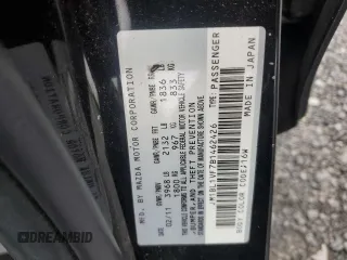 2011 Mazda 3 i Touring with VIN JM1BL1VF7B1462426, listed as a Copart auction lot 56901425 with 94,964 mi miles and Salvage title. Bid and sale history available at DreamBid. Image 12.