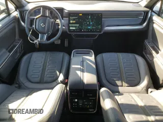 2023 Rivian R1T Adventure with VIN 7FCTGAAA3PN020577, listed as a Copart auction lot 84847414 with 7,888 mi miles and Salvage Title. Bid and sale history available at carsss.com. Image 8.