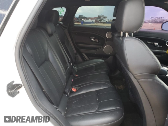 2018 Land Rover Range Rover Evoque SE Premium with VIN SALVC2RX1JH304975, listed as a Copart auction lot 57754274 with 74,350 mi miles and Salvage Title. Bid and sale history available at DreamBid. Image 11.