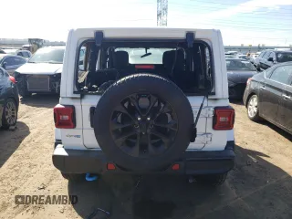 2023 Jeep Wrangler Sahara z VIN 1C4JJXP61PW519599, wystawiony jako Copart lot #51814674 z przebiegiem Nie podano mil oraz Szkoda całkowita • Salvage title. Historia ofert i sprzedaży dostępna na DreamBid. Obrazek 6.