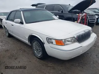 1999 Mercury Grand Marquis GS z VIN 2MEFM74W9XX622371, wystawiony jako IAAI lot #41721054 z przebiegiem 131 724 mil mil oraz . Historia ofert i sprzedaży dostępna na DreamBid. Obrazek 1.