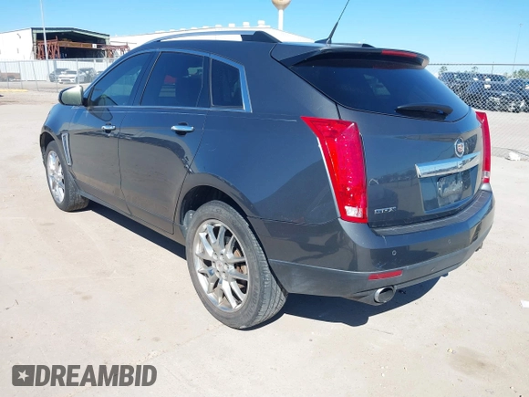 2013 Cadillac SRX Performance Collection with VIN 3GYFNDE38DS568561, listed as a IAAI auction lot 41701063 with 139,191 mi miles. Bid and sale history available at carsss.com. Image 3.