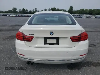 2015 BMW 4 Series 428i xDrive с VIN WBA4C9C52FD330306, выставлен на аукционе Copart как лот 60834435 с пробегом 167 034 миль миль и Списание • Salvage title. История ставок и продаж доступна на DreamBid. Изображение 6.