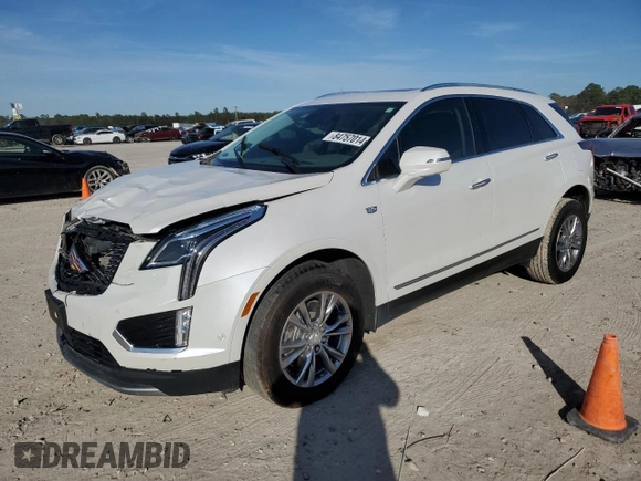 2023 Cadillac XT5 FWD Premium Luxury with VIN 1GYKNCRS7PZ150378, listed as a Copart auction lot 84757014 with 21,631 mi miles and Salvage Title. Bid and sale history available at carsss.com. Image 1.