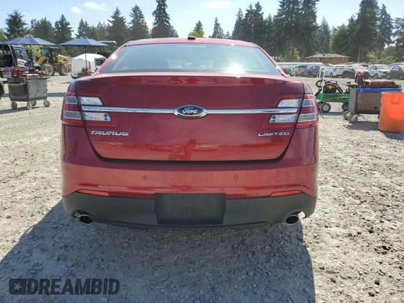 2013 Ford Taurus Limited z VIN 1FAHP2F84DG217500, wystawiony jako Copart lot #64268005 z przebiegiem 120 277 mil mil oraz Szkoda całkowita • Salvage title. Historia ofert i sprzedaży dostępna na DreamBid. Obrazek 6.