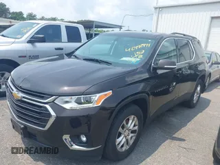 2019 Chevrolet Traverse LT Cloth z VIN 1GNEVGKW3KJ102804, wystawiony jako IAAI lot #42492949 z przebiegiem 144 895 mil mil oraz . Historia ofert i sprzedaży dostępna na DreamBid. Obrazek 18.