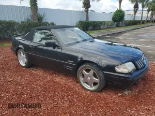 1997 Mercedes-Benz SL-Class with VIN WDBFA67F3VF147355, listed as a Copart auction lot 74295594 with 0 mi miles and Salvage Title. Bid and sale history available at carsss.com. Image 4.