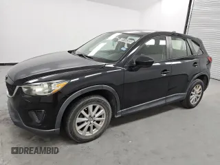 2014 Mazda CX-5 Sport with VIN JM3KE2BE2E0430268, listed as a Copart auction lot 55159305 with 140,546 mi miles and Clean title. Bid and sale history available at DreamBid. Image 1.