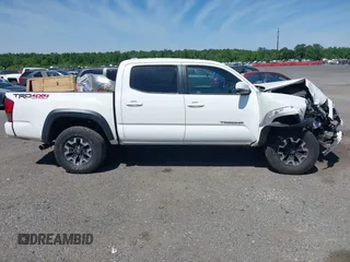 2016 Toyota Tacoma SR with VIN 3TMCZ5AN0GM003224, listed as a IAAI auction lot 42289910 with 140,899 mi miles and . Bid and sale history available at DreamBid. Image 13.