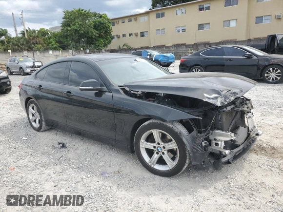 2015 BMW 4 Series 428i with VIN WBA4A5C55FG051557, listed as a Copart auction lot 47899115 with 91,292 mi miles and Salvage Title. Bid and sale history available at DreamBid. Image 4.