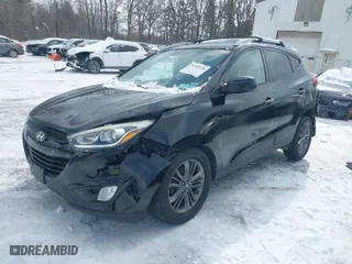 2015 Hyundai Tucson SE with VIN KM8JU3AG2FU103035, listed as a IAAI auction lot 41592256 with 105,792 mi miles. Bid and sale history available at carsss.com. Image 2.