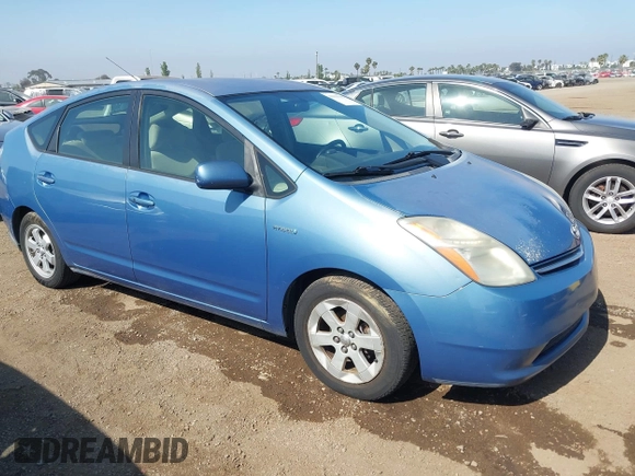 2006 Toyota Prius z VIN JTDKB20U063175034, wystawiony jako IAAI lot #42339383 z przebiegiem Nie podano mil oraz . Historia ofert i sprzedaży dostępna na DreamBid. Obrazek 1.