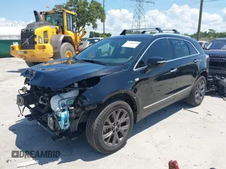 2020 Cadillac XT5 Luxury FWD with VIN 1GYKNAR47LZ239819, listed as a IAAI auction lot 42600145 with 64,311 mi miles and . Bid and sale history available at DreamBid. Image 2.