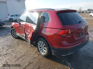 2018 Volkswagen Tiguan S with VIN 3VV1B7AX2JM050594, listed as a IAAI auction lot 41681117 with 134,654 mi miles. Bid and sale history available at carsss.com. Image 3.