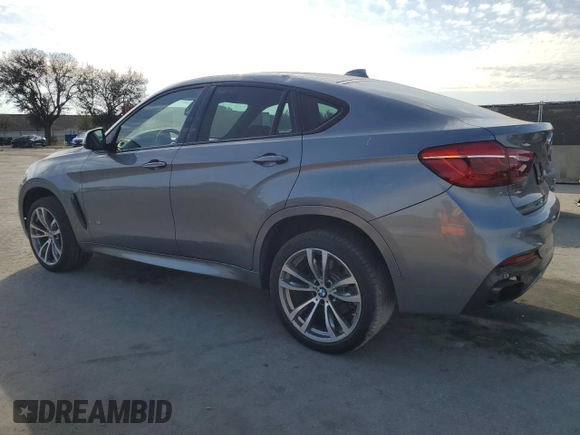 2016 BMW X6 xDrive50i with VIN 5UXKU6C5XG0R34151, listed as a Copart auction lot 44387725 with 158,088 mi miles and Clean Title. Bid and sale history available at carsss.com. Image 2.