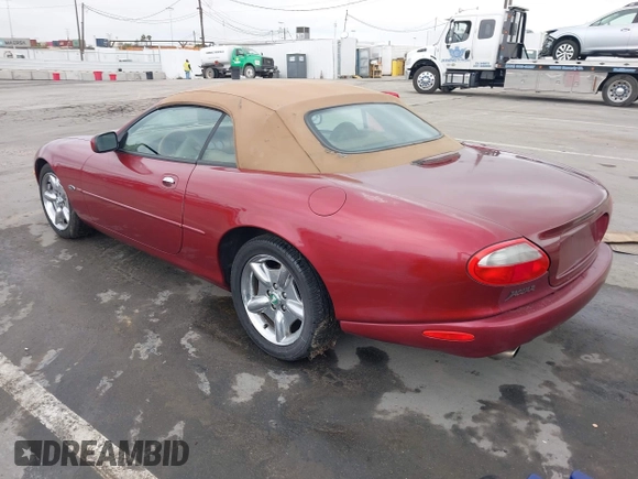 1997 Jaguar XK with VIN SAJGX2745VC017589, listed as a IAAI auction lot 42208129 with Not Provided miles and . Bid and sale history available at DreamBid. Image 3.