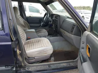 1998 Jeep Cherokee Sport with VIN 1J4FT68S2WL237956, listed as a IAAI auction lot 41846188 with 1 mi miles. Bid and sale history available at carsss.com. Image 5.