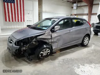 2013 Hyundai Accent GL with VIN KMHCT5AE6DU129091, listed as a Copart auction lot 52282095 with 203,493 mi miles and Salvage Title. Bid and sale history available at carsss.com. Image 1.