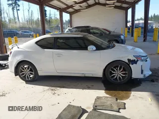 2014 Scion tC with VIN JTKJF5C7XE3073478, listed as a IAAI auction lot 42058385 with 151,491 mi miles. Bid and sale history available at carsss.com. Image 14.