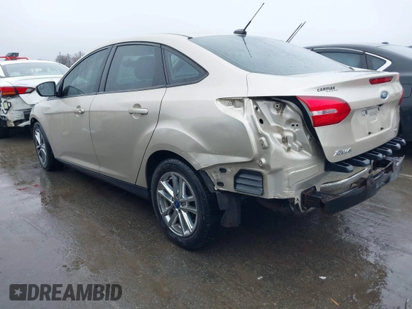 2018 Ford Focus SE with VIN 1FADP3F27JL219423, listed as a IAAI auction lot 41575274 with 73,574 mi miles. Bid and sale history available at carsss.com. Image 3.