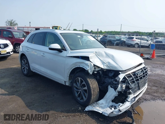 2021 Audi Q5 Premium Plus z VIN WA1BAAFYXM2050028, wystawiony jako IAAI lot #42479898 z przebiegiem 39 015 mil mil oraz . Historia ofert i sprzedaży dostępna na DreamBid. Obrazek 1.