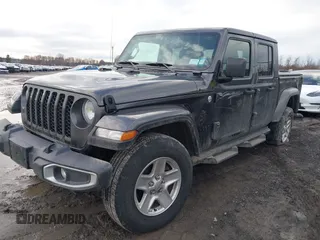 2021 Jeep Gladiator Willys with VIN 1C6HJTAGXML502037, listed as a IAAI auction lot 41225448 with 53,154 mi miles and . Bid and sale history available at carsss.com. Image 18.