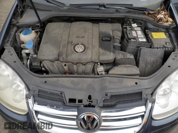 2010 Volkswagen Jetta S z VIN 3VWJX7AJ7AM027269, wystawiony jako Copart lot #60443375 z przebiegiem Nie podano mil oraz Szkoda całkowita • Salvage title. Historia ofert i sprzedaży dostępna na DreamBid. Obrazek 11.