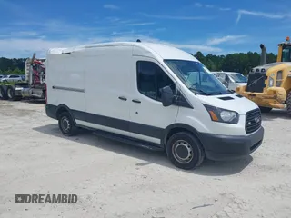 2019 Ford Transit with VIN 1FTYR2CM9KKB07381, listed as a IAAI auction lot 42506233 with 96,311 mi miles and . Bid and sale history available at DreamBid. Image 1.
