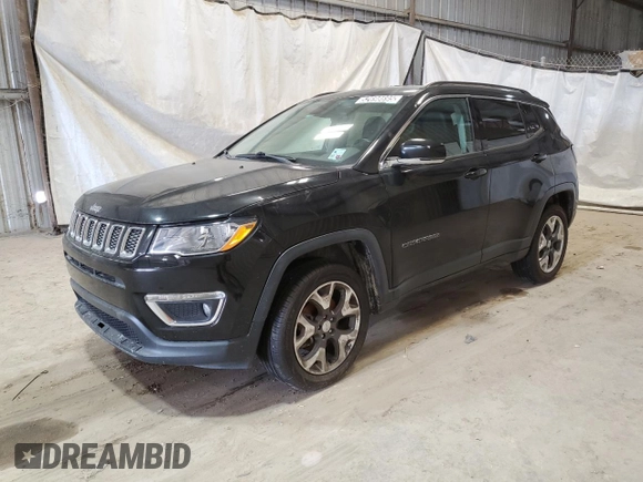 2018 Jeep Compass Limited with VIN 3C4NJDCBXJT399754, listed as a Copart auction lot 52698695 with 99,960 mi miles and Clean Title. Bid and sale history available at DreamBid. Image 1.