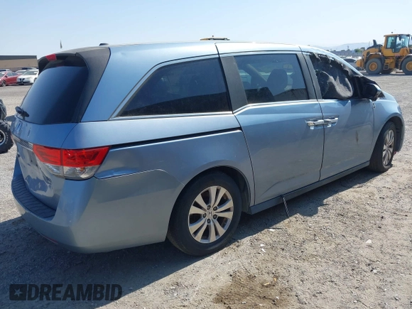 2014 Honda Odyssey EX-L with VIN 5FNRL5H65EB103900, listed as a IAAI auction lot 42592359 with 53,276 mi miles and . Bid and sale history available at DreamBid. Image 4.