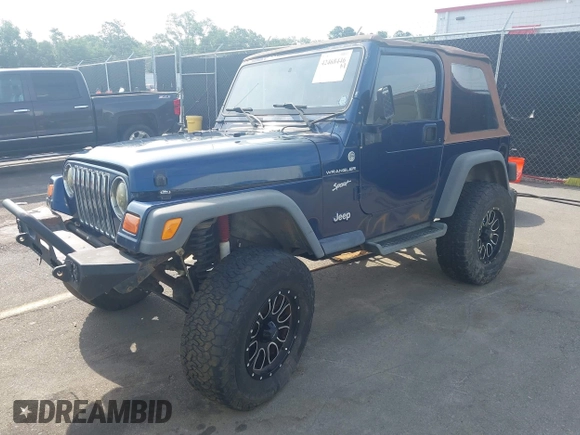2002 Jeep Wrangler Sport with VIN 1J4FA49S72P729703, listed as a IAAI auction lot 42468446 with 164,342 mi miles and . Bid and sale history available at DreamBid. Image 2.
