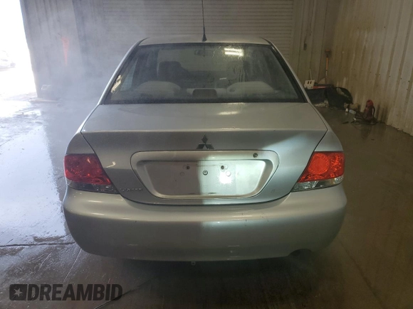 2006 Mitsubishi Lancer ES z VIN JA3AJ26E36U014104, wystawiony jako Copart lot #59814245 z przebiegiem 144 780 mil mil oraz Nie do naprawy • Non repairable. Historia ofert i sprzedaży dostępna na DreamBid. Obrazek 6.