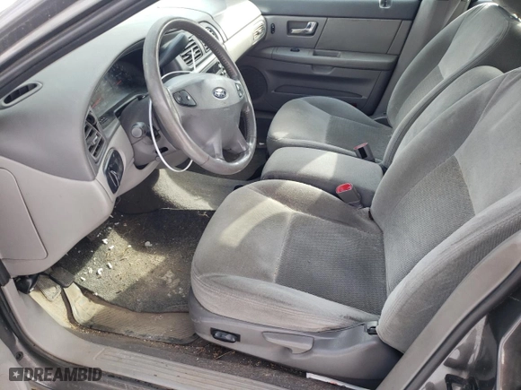 2003 Ford Taurus SE Standard with VIN 1FAFP58UX3G115054, listed as a Copart auction lot 44332175 with 213,488 mi miles and Clean Title. Bid and sale history available at carsss.com. Image 7.