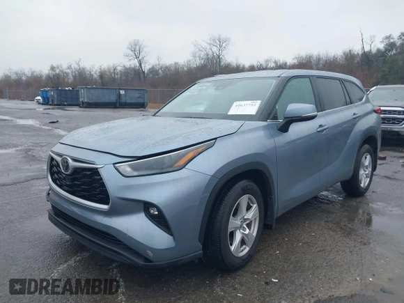 2023 Toyota Highlander L with VIN 5TDKDRAH8PS524459, listed as a IAAI auction lot 41637752 with 10,156 mi miles and . Bid and sale history available at DreamBid. Image 2.
